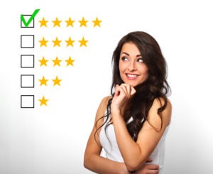 woman admires a company’s five-star rating
