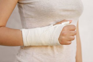 young woman with her damaged right arm
