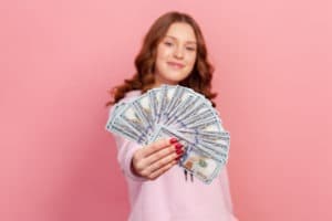 young woman with money